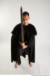 Man Adult Athletic White Fighting with sword Standing poses Coat
